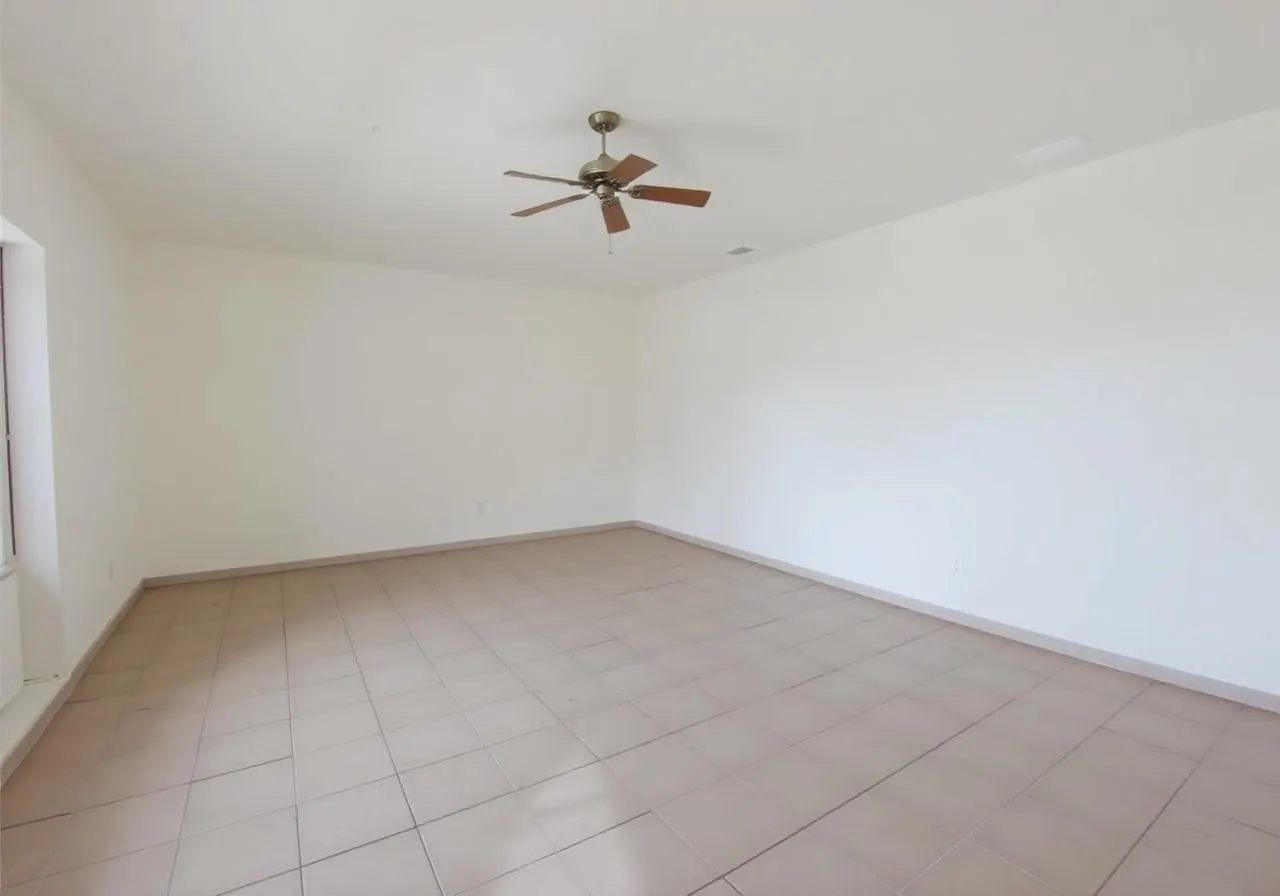 Living Room before StayStyled renovation showing empty unstyled space